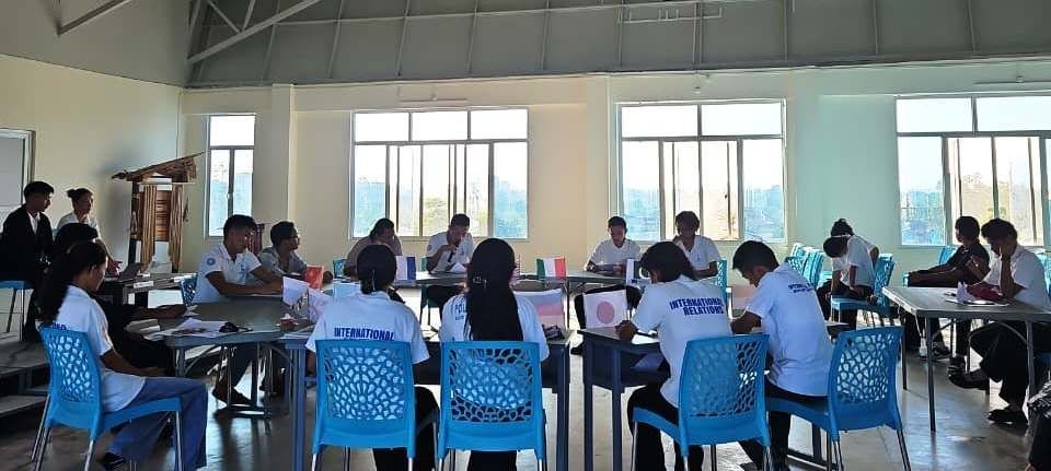 Students representing various nations during the diplomatic debate simulation on UNSC reform organised by the International Relations Programme at NECU, Dimapur.